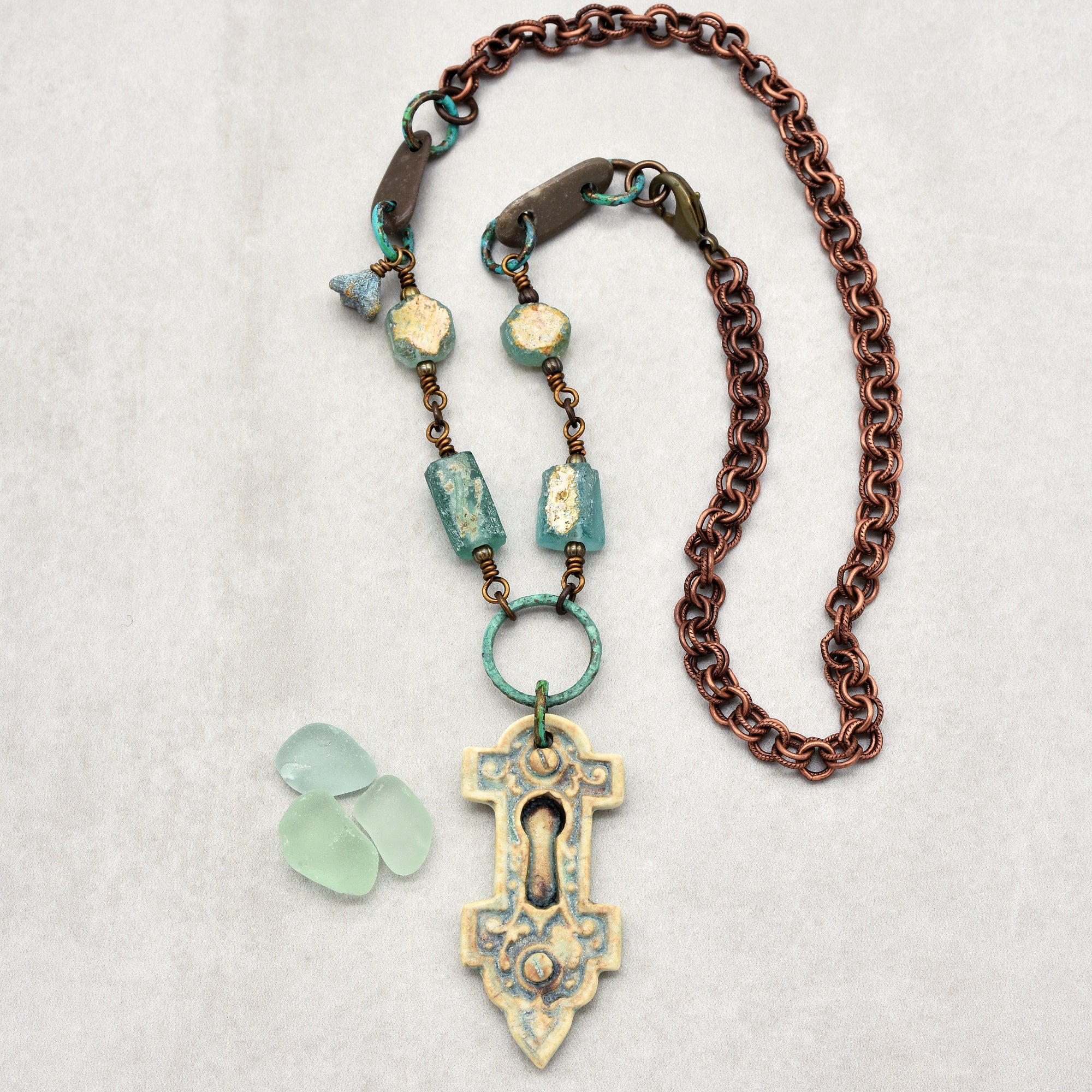 Roman Glass Verdigris Handmade Necklace with Artisan Porcelain Focal, Beach Stones, Roman Glass