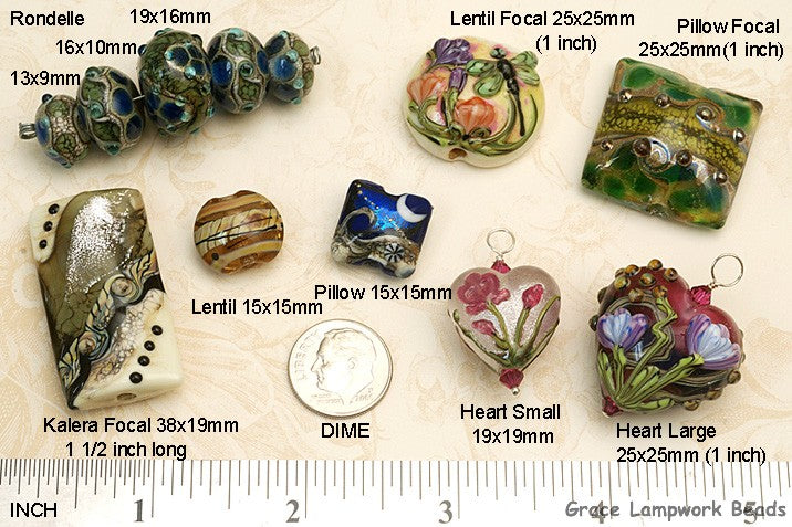Various size lampwork beads shown for scale | Handmade Jewelry | Ruby Acorn