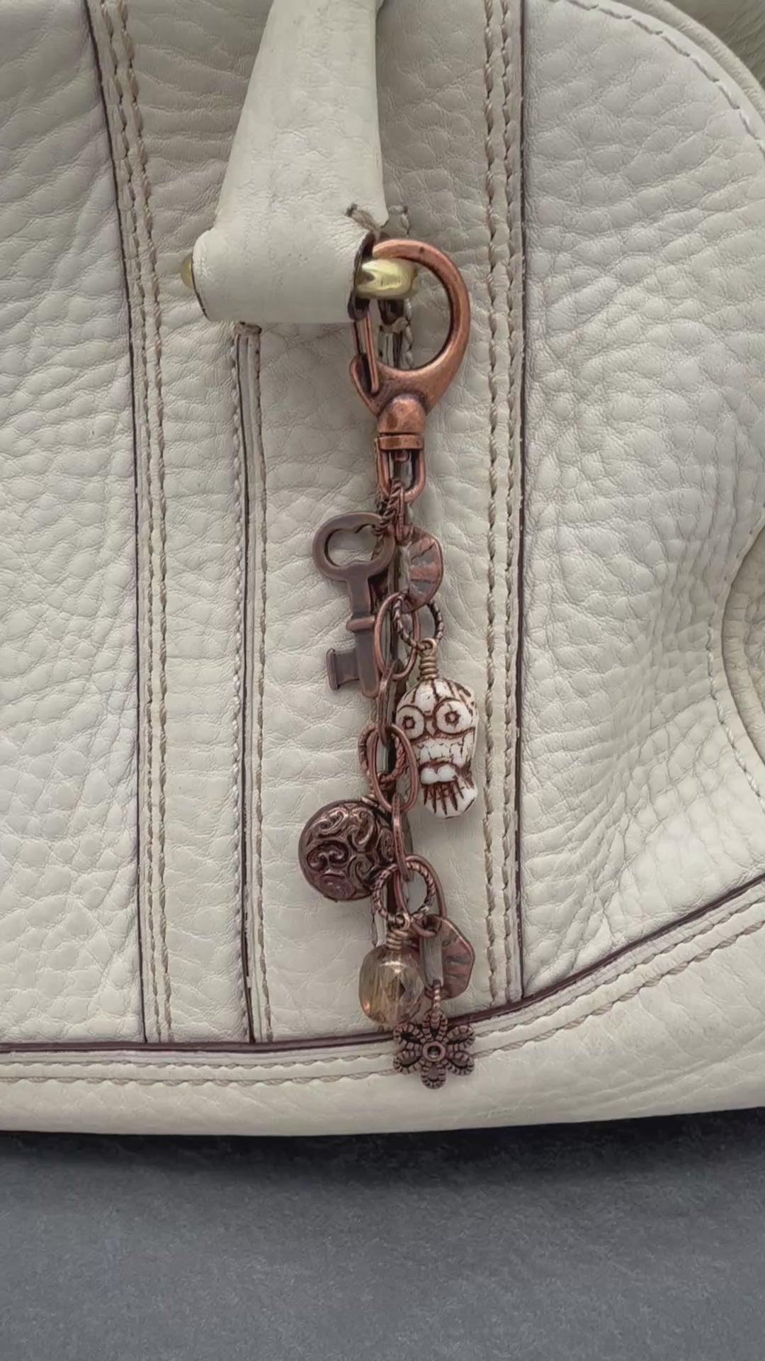 Video of copper handbag charm