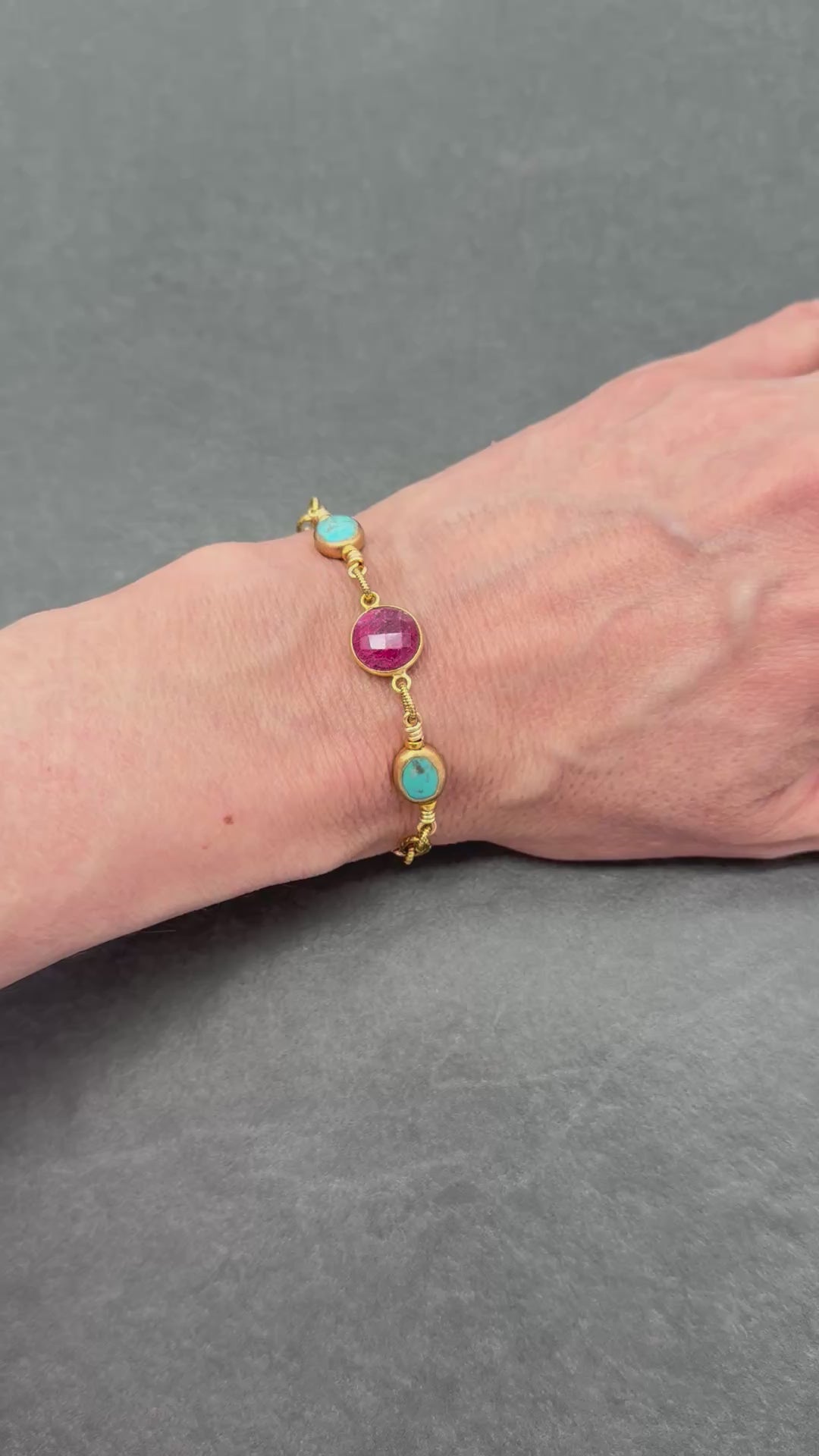 Video of a hand wearing a gold bracelet with colorful beads - art you can wear by Ruby Acorn