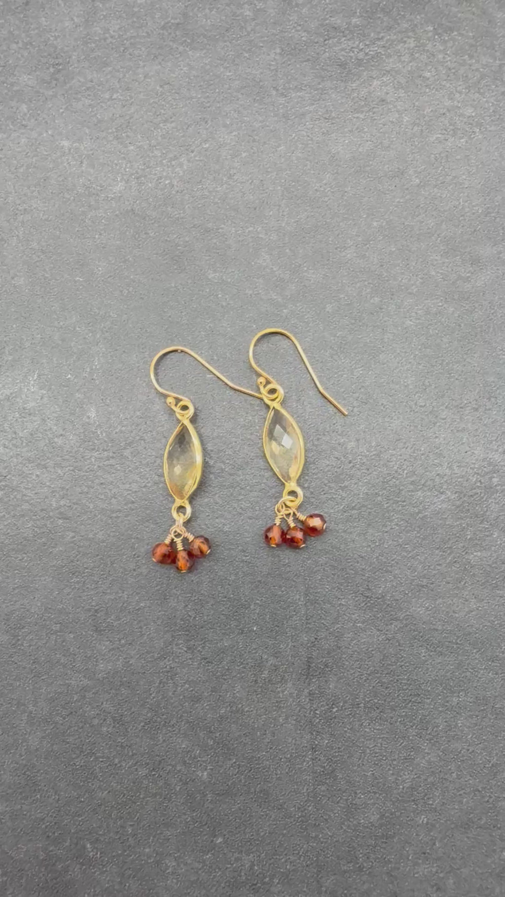 Video of Sol Spice Earrings featuring citrine vermeil wrapped links and natural hessonite garnet rounds, handmade by Ruby Acorn