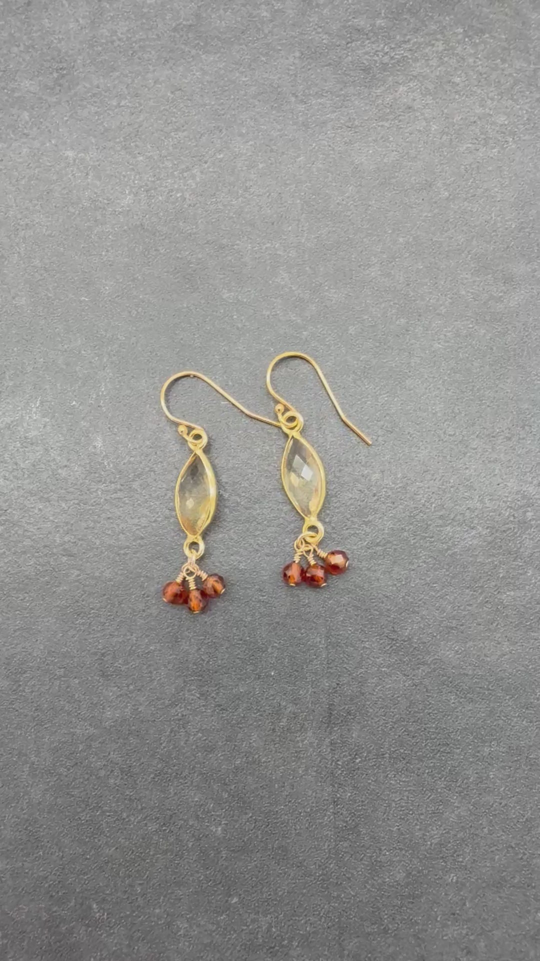 Video of Sol Spice Earrings featuring citrine vermeil wrapped links and natural hessonite garnet rounds, handmade by Ruby Acorn