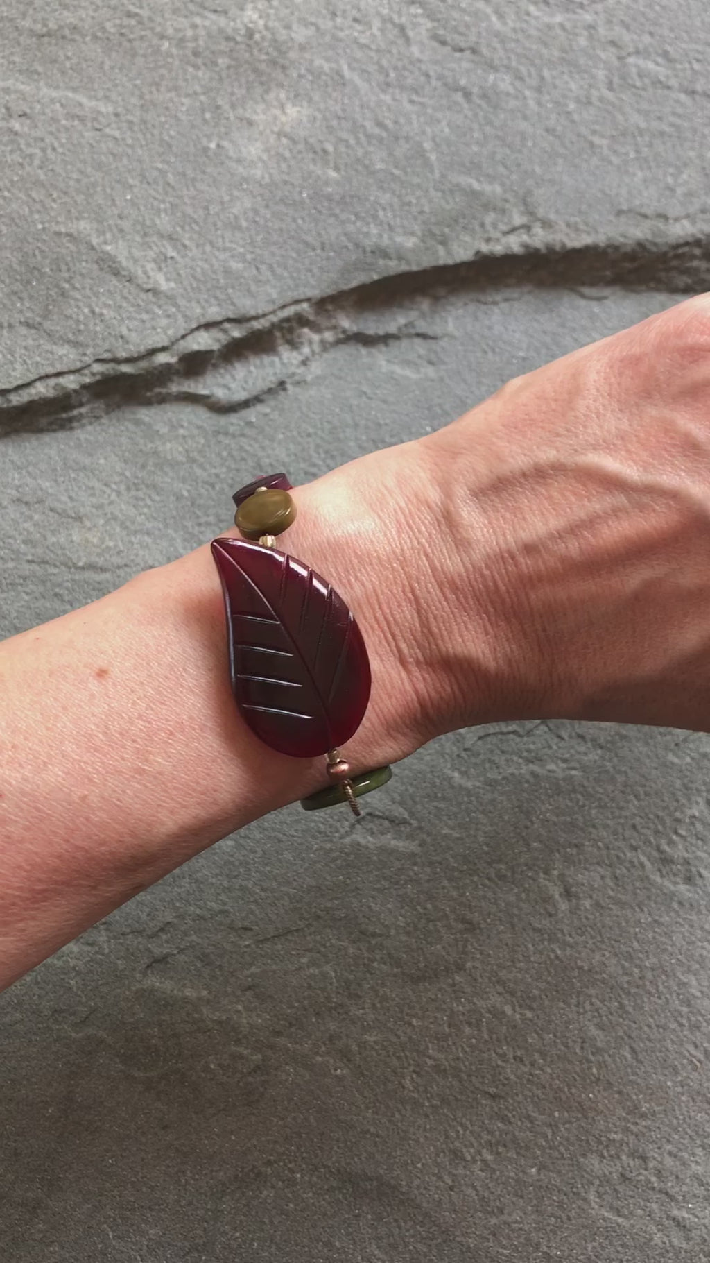 Video of a hand wearing Merlot Leaf bracelet.