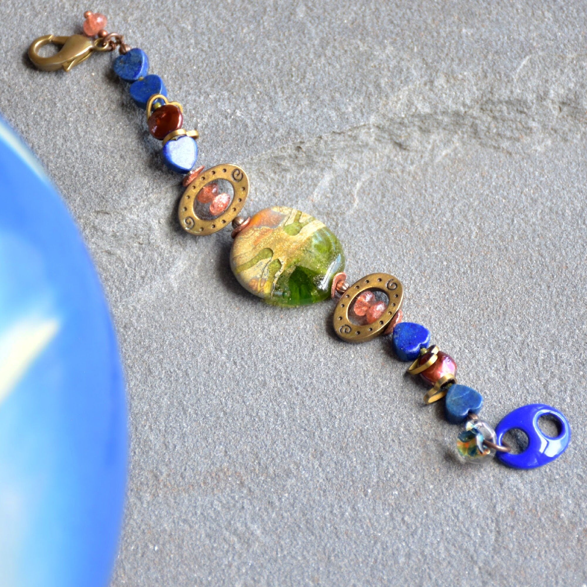 Denim Days Lapis Blue Handmade Beaded Bracelet with Sunstone and Artisan Olive Green Glass Focal