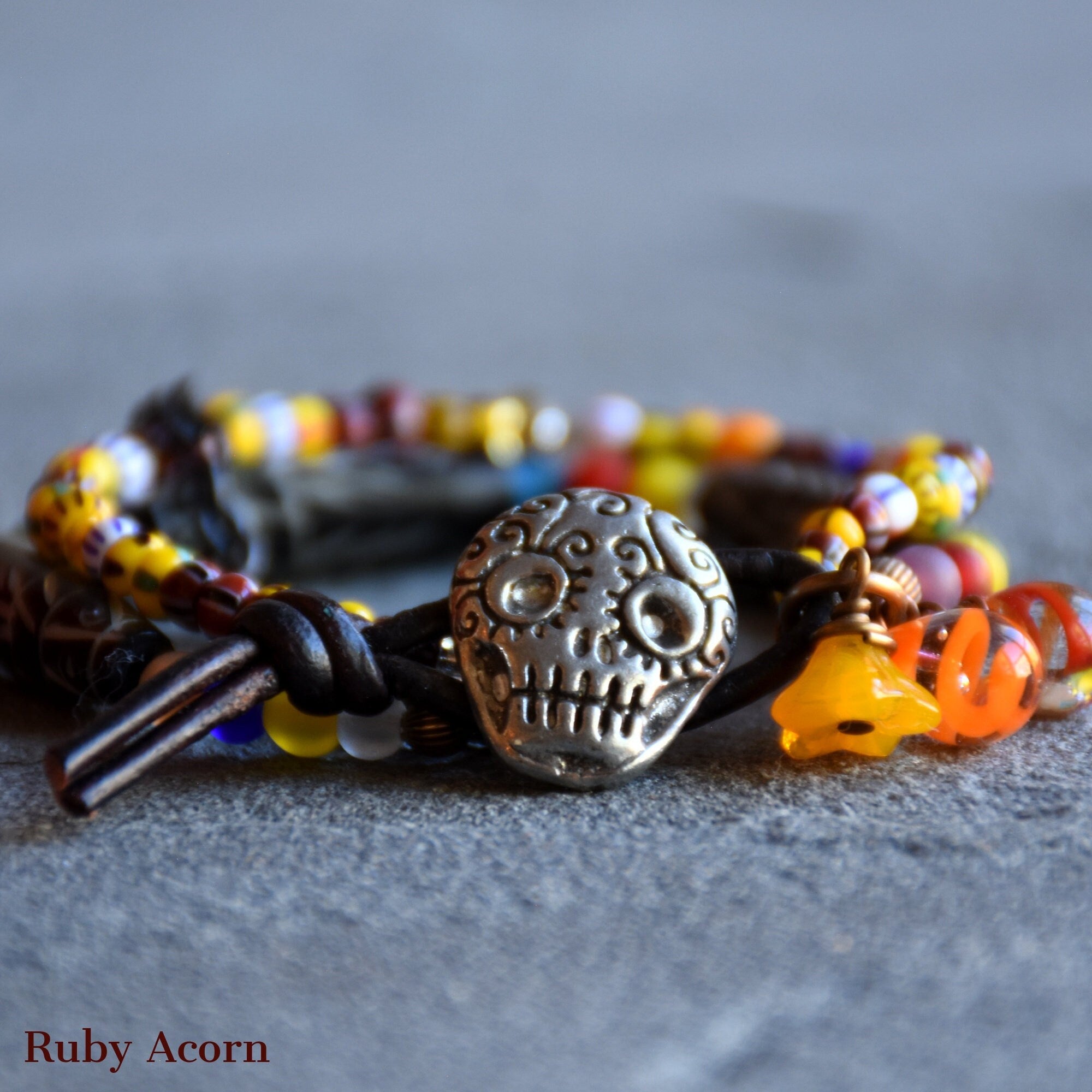 Azucar Dia de los Muertos Handmade Bracelet Artisan pewter Sugar Skull button, carved bone beads, Artisan lampwork glass