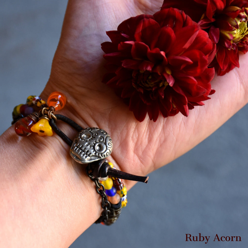 Azucar Dia de los Muertos Handmade Bracelet Artisan pewter Sugar Skull button, carved bone beads, Artisan lampwork glass