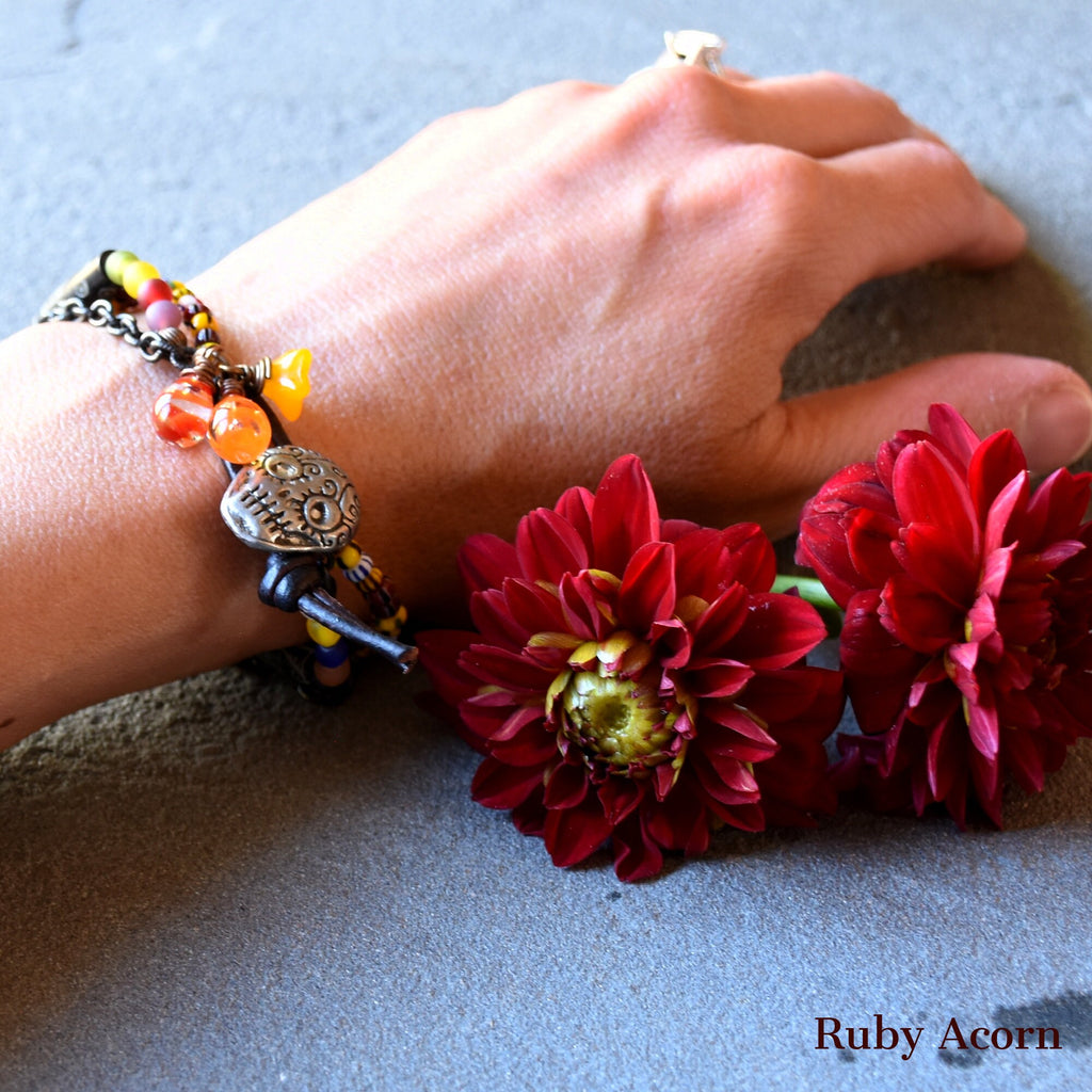 Azucar Dia de los Muertos Handmade Bracelet Artisan pewter Sugar Skull button, carved bone beads, Artisan lampwork glass