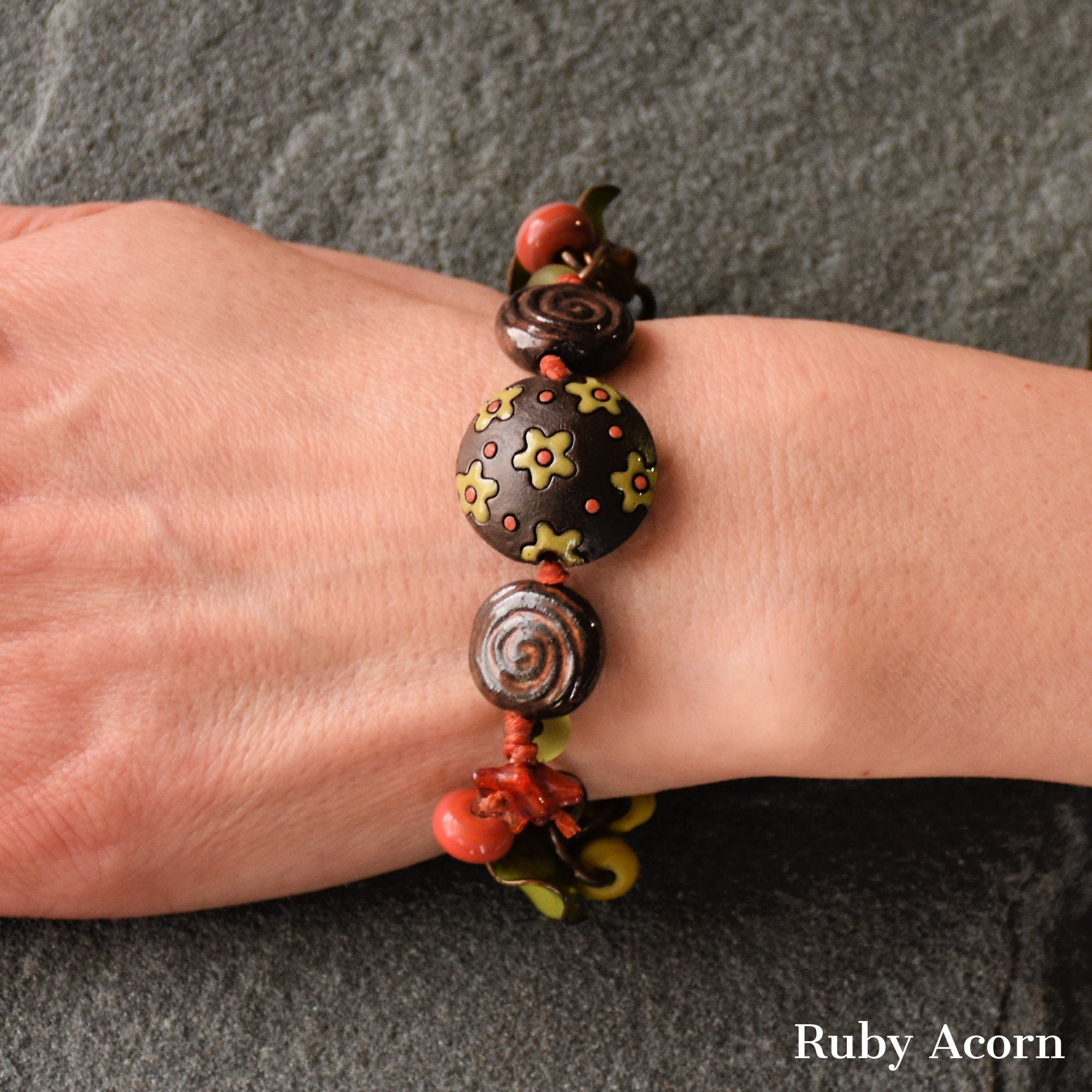 Fiesta Handmade Olive Green and Orange Bracelet with Artisan ceramic, artisan enameled flowers, artisan lampwork glass, Czech glass