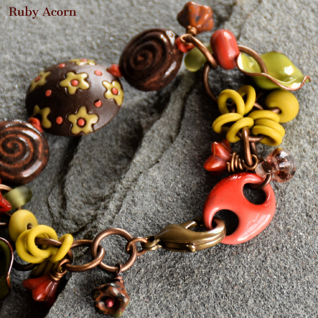 Fiesta Handmade Olive Green and Orange Bracelet with Artisan ceramic, artisan enameled flowers, artisan lampwork glass, Czech glass