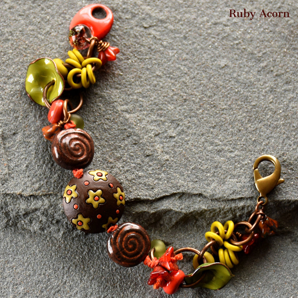 Fiesta Handmade Olive Green and Orange Bracelet with Artisan ceramic, artisan enameled flowers, artisan lampwork glass, Czech glass