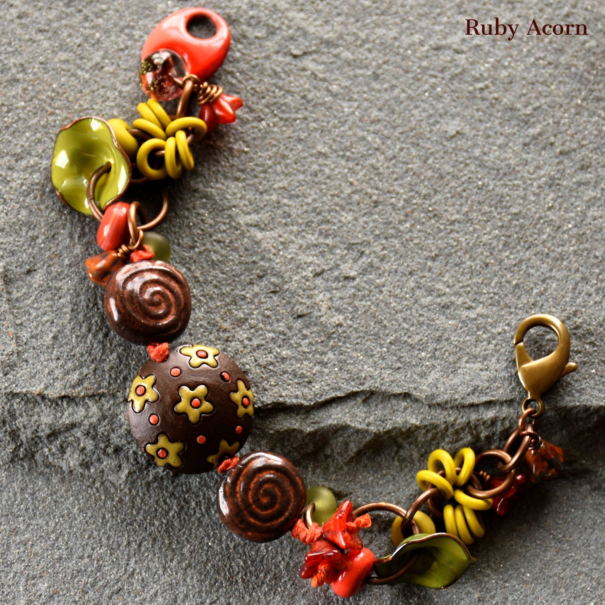 Fiesta Handmade Olive Green and Orange Bracelet with Artisan ceramic, artisan enameled flowers, artisan lampwork glass, Czech glass