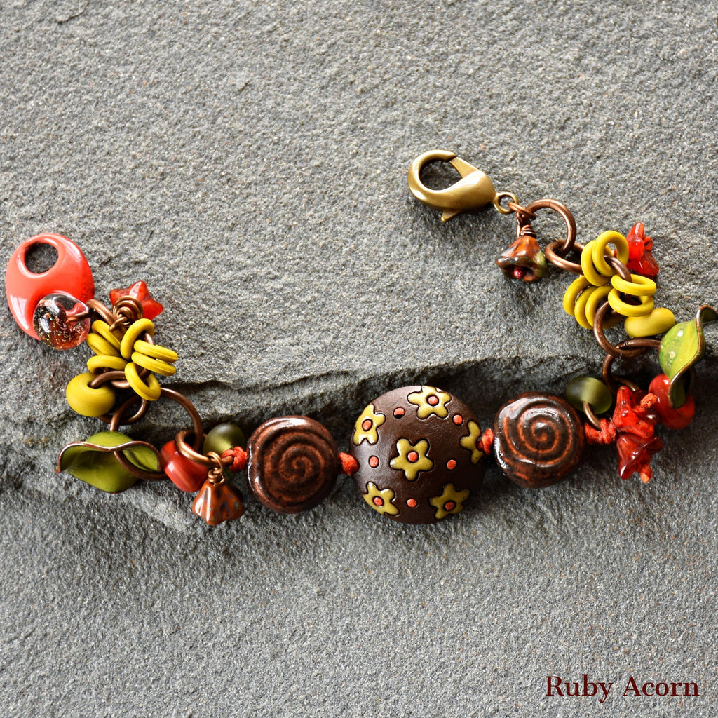 Fiesta Handmade Olive Green and Orange Bracelet with Artisan ceramic, artisan enameled flowers, artisan lampwork glass, Czech glass